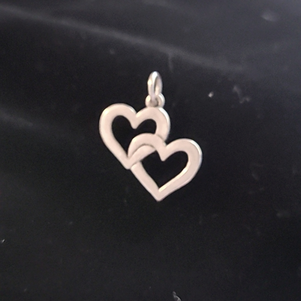Retired vintage james Avery double heart charm